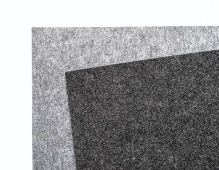 gray felt pieces on a white backgroundの写真素材