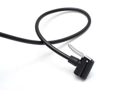 Detail of black bicycle air pump isolated over white backgroundの写真素材