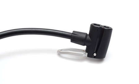 Detail of black bicycle air pump isolated over white backgroundの写真素材