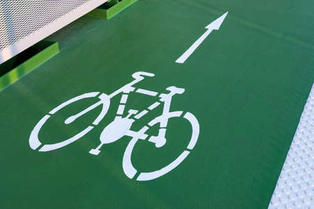 Bicycle road sign and arrowの写真素材