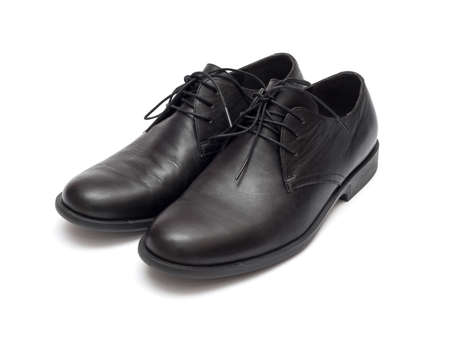 black men's shoes on a white backgroundの写真素材