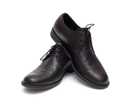 black men's shoes on a white backgroundの写真素材