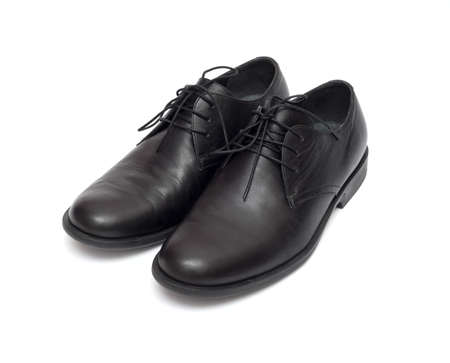black men's shoes on a white backgroundの写真素材