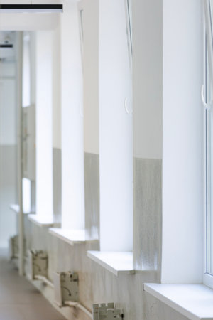 Empty hallway interior with big windows, copy space. Real estate or office rental concept, empty...