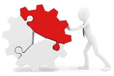 3d man pushing cogwheel made of puzzle pieces on white backgroundの写真素材