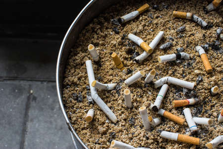 the cigarettes in bin of the publicの写真素材