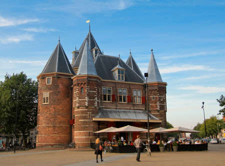 View the plaza of De Waag, a historic medieval building of Amsterdam city のeditorial素材