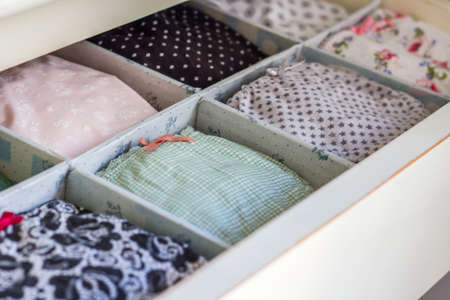 Female underwear with different patterns and lazes ordered in a personal wardrobeの写真素材