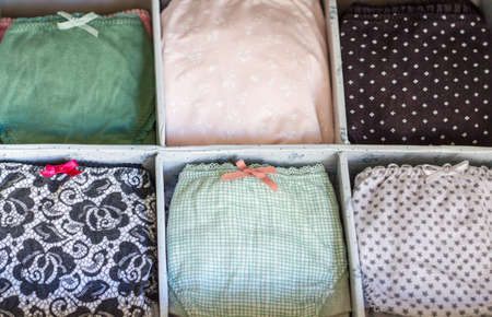Female underwear with different patterns and lazes ordered in a personal wardrobeの写真素材