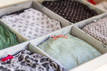 Female underwear with different patterns and lazes ordered in a personal wardrobeの写真素材