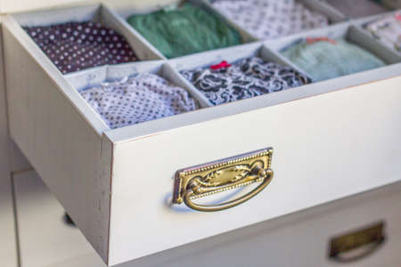 Female underwear with different patterns and lazes ordered in a personal wardrobeの写真素材