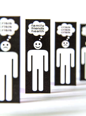 Line of negative paper men symbols thinking about crisis and one positive for the family, friends and healthの写真素材