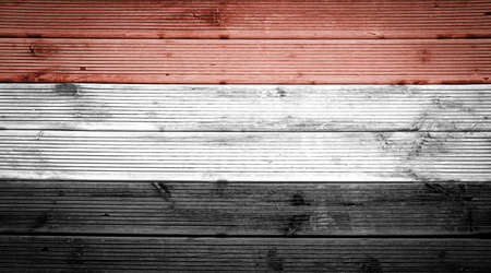 Natural wood planks texture background with the colors of the flag of Egyptの写真素材