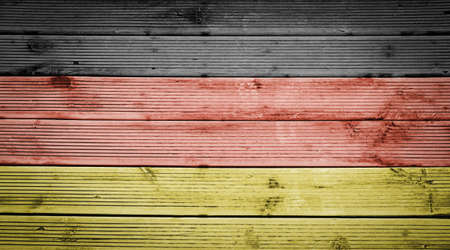 Natural wood planks texture background with the colors of the flag of Germanyの写真素材