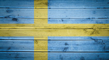 Natural wood planks texture background with the colors of the flag of Swedenの写真素材