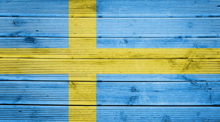 Natural wood planks texture background with the colors of the flag of Swedenの写真素材