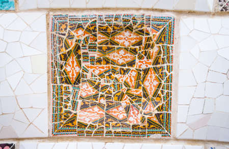 Famous colorful ceramic mosaics detail, designed by Antonio Gaudi and better known as  trencadis  ...