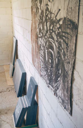 Set of finished modern artworks in a professional artist studio