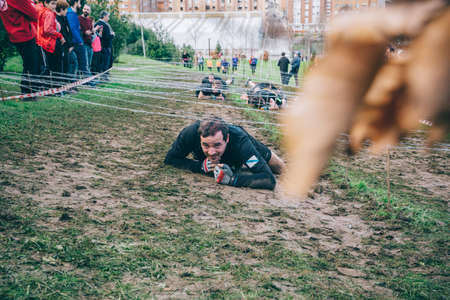 GIJON, SPAIN - JANUARY 31, 2016: The Farinato Race, a extreme obstacle race, celebrated in Gijon,...