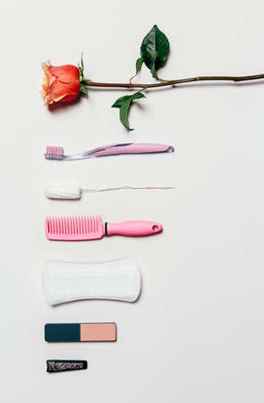 Composition of feminine intimate hygiene set over white background. View from above.の写真素材
