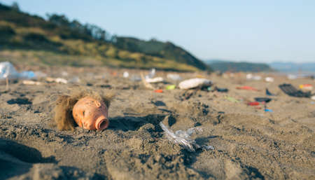 Dirty beach landscape full of waste without peopleの写真素材