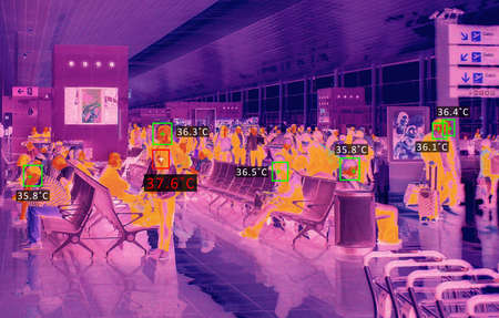 Thermal screen scanner checking travellers temperatureの写真素材