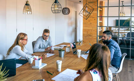 Young people at a business meeting in the officeの写真素材