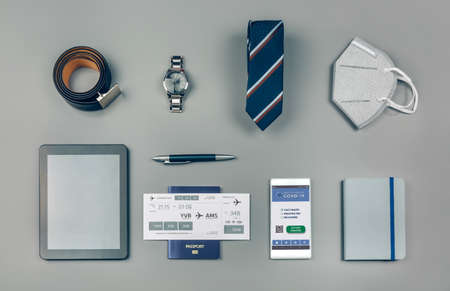Background set with mobile  passport and businessman trip accessories