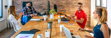 People in an informal business meeting in the office