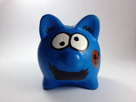 Piggy bank funny face in blueの素材