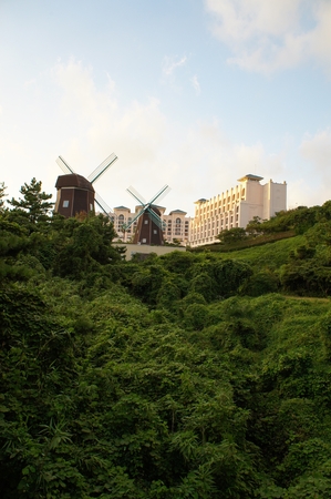 Windmills in front of buildingsのeditorial素材