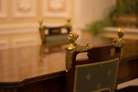 vintage chair with the figure of a womanの写真素材