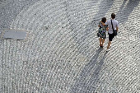 Happy couple going on a roadwayの写真素材