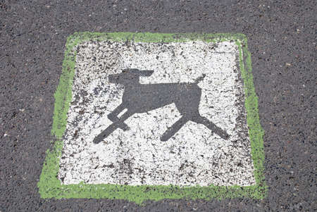 Sanction sign to walk with dogs on park's roadの写真素材