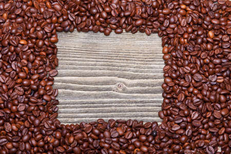 coffee frame on a wooden backgroundの写真素材
