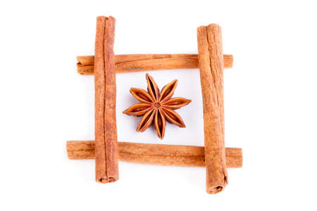 cinnamon and anise on a white backgroundの写真素材