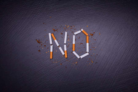 antismoking poster on dark stone backgroundの写真素材