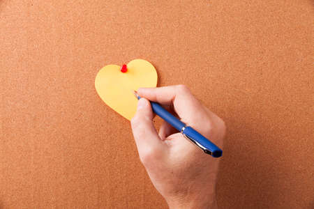 sticker-heart on corkboardの写真素材