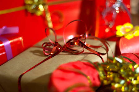 Present boxes on a gold background texture