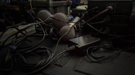 few microphones in sound studio with wiresの写真素材