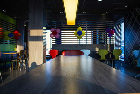 tables and chairs in a cafe Mcdonalds belarusのeditorial素材