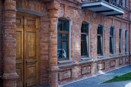 Vintage old brick window facade balcony doorsの写真素材