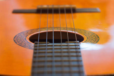 Acoustic guitar fretboard strings melody music songの写真素材