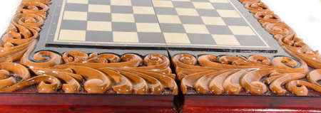 wooden chessboard handmade. woodcarving. game of chessの写真素材