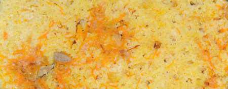 Fragrant pilaf with meat and vegetables close up on a plate. horizontalの写真素材