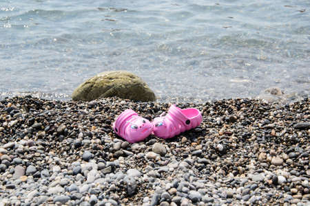 Slippers on beachの写真素材
