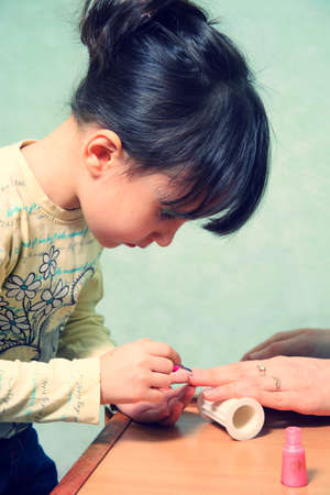 play Manicure. Mom and daughter.の写真素材