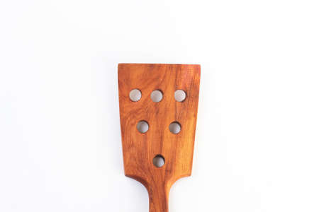 Old wooden spoons and stirrers on white background. Isolatedの写真素材