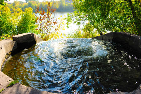 The water beats in a large wellの写真素材