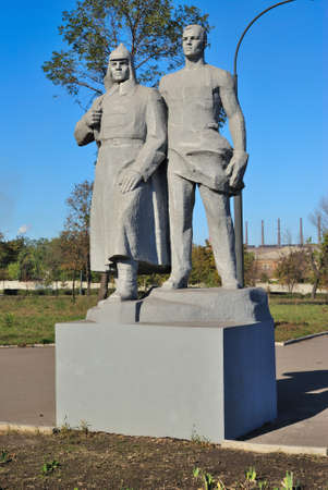 Alchevsk, Ukraine - October 14, 2010: Sculptural group metallurgists, fighters for Soviet power - 1973のeditorial素材